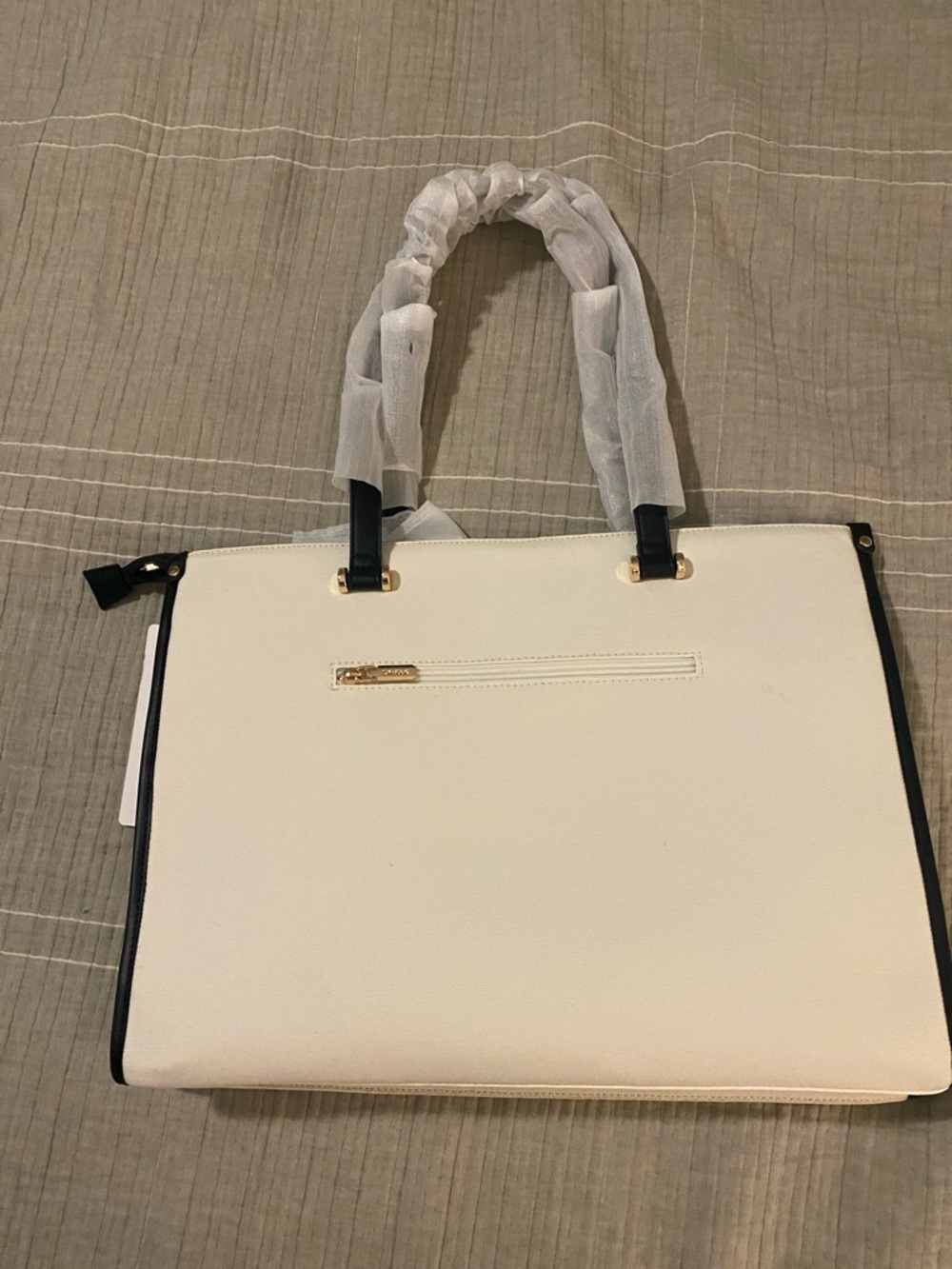 Structured White Tote with Black Trim and Gold Accents
